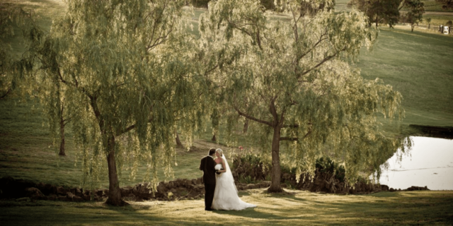 Couple exchanging vows at voco™ Kirkton Park Hunter Valley.