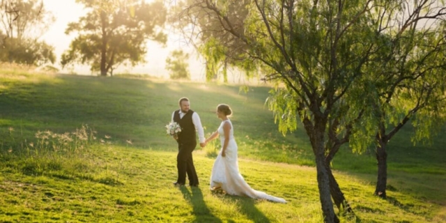 couple-walking-field