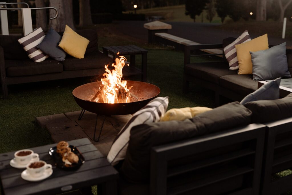 Hot chocolate and cookies by the outdoor fire pit at voco Kirkton Park